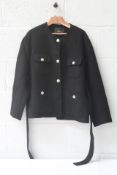 A Maje black short four pocket metal button collarless jacket with belt, size 42T (122GIFace).