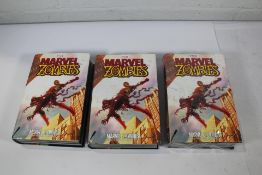 Three Marvel Zombies Omnibus hardback books (Please note corners and covers have slight damage).