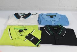 Four assorted Hugo Boss (Sample) polo tops Sizes (2 x M, 2 X L).