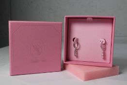 A pair of as new Swarovski Earrings Attract Trilogy Round Cry 5416155.