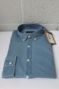 A Balibaris College dark navy shirt (Size M).