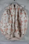 A women's as new Simone Rocha Oversized Puff Sleeve Bomber Jacket with floral print (S).