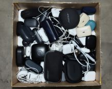 A large quantity of pre-owned wireless and wired in-ear earphones and charging cases to include Appl