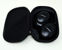 A pre-owned pair of Bose QuietComfort 45 Wireless Noise Cancelling Over-Ear Headphones in Black with