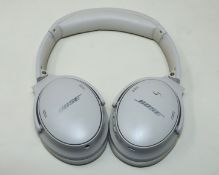 A pre-owned pair of Bose QuietComfort 45 Wireless Noise Cancelling Over-Ear Headphones in White Smok