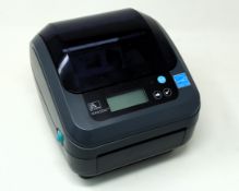 A pre-owned Zebra GX420d Serial/Wi-Fi/USB Thermal Transfer Label Printer (P/N: GX42-202720-000) (Pow