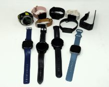 A quantity of smartwatches sold for parts to include: 3 x Apple Watches (Activation locked), 1 x Gar