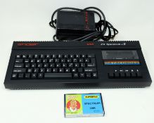 A pre-owned Sinclair ZX Spectrum +2 128K Vintage Computer with power supply and Ian Botham's Test Ma