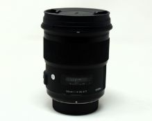 A pre-owned Sigma 50mm F1.4 DG HSM Art Lens for Nikon (Grade B).