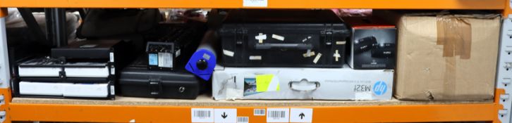 A quantity of assorted as new and pre-owned electronic items (All items sold as seen. One Shelf).