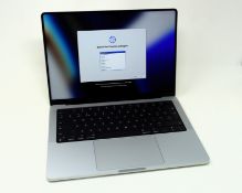 A pre-owned Apple MacBook Pro 14