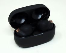 A pre-owned pair of Sony WF-1000XM4 True Wireless Noise Cancelling Earphones in Black (Grade B/C).