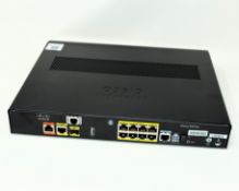 A pre-owned Cisco C897VA-K9 Integrated Services Router.