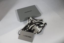 Fifty boxed as new Balenciaga face masks.