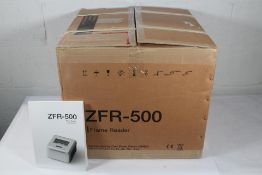 An as new Huvitz Carl Zeiss ZFR-500 Frame Reader, requires a UK power adapter.