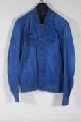 A pre-owned Diesel embroidered Jacket in Blue, Size Medium.