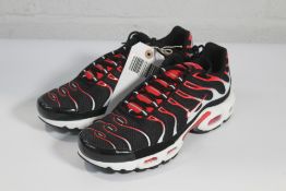A pair of pre-owned Nike Air Max Plus TN in Black/White/University Red, Size UK 7 (In good Condition