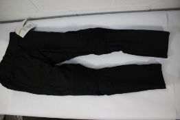 Six pairs of women's motorcycle trouser in black (14 long).