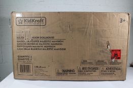 A boxed as new KidKraft Majestic Mansion Dollhouse.