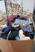 A pallet of pre-owned clothing and related items.