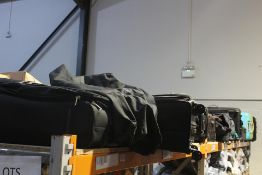 A quantity of assorted pre-owned suitcases/holdalls in various sizes (Approximately 24 items).