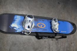 A pre-owned Scott Aurora Snowboard.