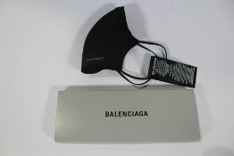 Fifty boxed as new Balenciaga face masks.