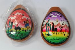 Approximately fifty as new six hole Ocarinas.