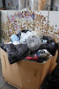A pallet of pre-owned clothing and related items.