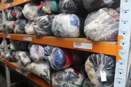 Twenty four bags of pre-owned clothing and related items.