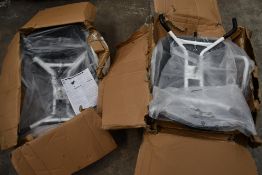 Two pre-owned Pe Pe Mobility Swivel Bath Chairs, boxes damaged and may be incomplete.