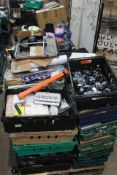 A pallet of approximately twenty seven crates of assorted miscellaneous items to include homewares,