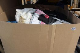 A pallet of pre-owned clothing and related items.