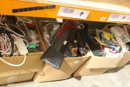 Four boxes of assorted miscellaneous items to include soft toy, homewares, books and related items.