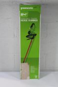 An as new Greenworks 24V Hedge Trimmer (No battery or charger included).