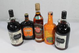 Two bottles of The Kraken Black Spiced Rum (2 x 1ltr), a Dead Man's Finger Pineapple Rum (700ml), a