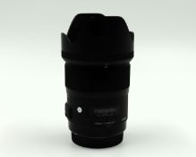 A pre-owned Sigma 35mm f/1.4 DG HSM Art Lens for Canon (Grade B).