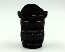 A pre-owned Sigma 10-20mm f/4-5.6 EX DC HSM Lens for Canon EF-S (Grade C).
