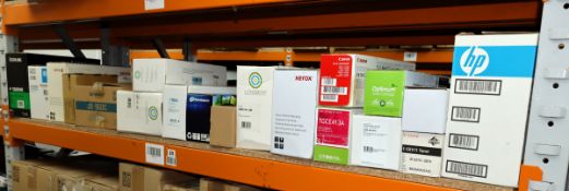 A quantity of assorted printer ink and toner cartridges.