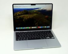 A pre-owned Apple MacBook Air 13.6