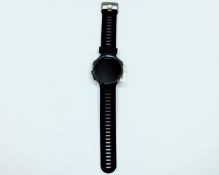 A pre-owned Garmin Forerunner 735XT GPS Multisport and Running Watch in Black/Grey (P/N: S10-U1614-0