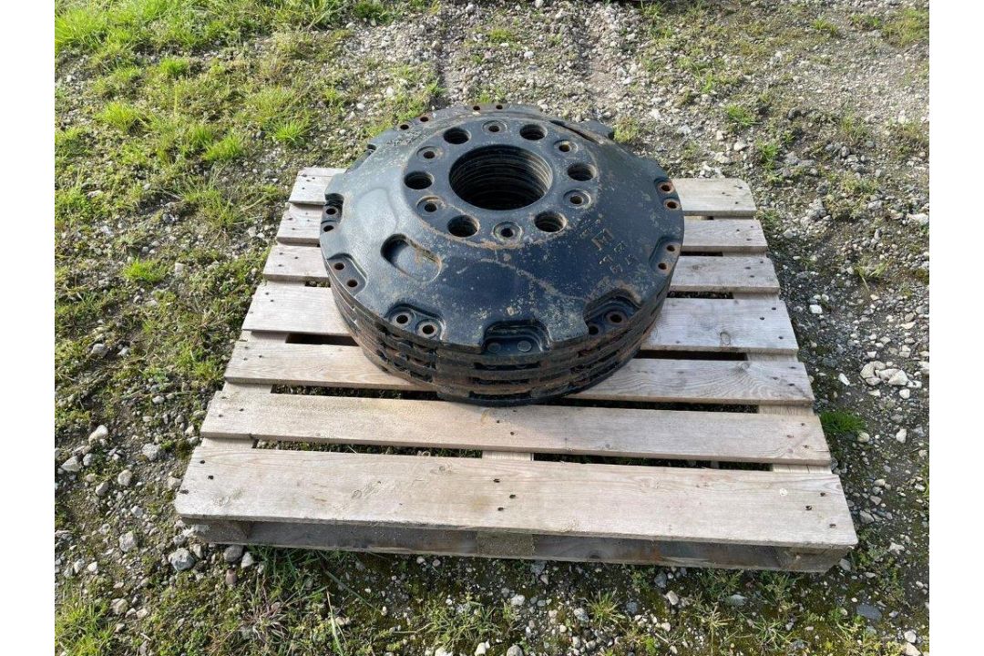 Challenger crawler idler weights