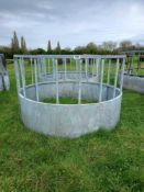 2 cattle round bale feeders