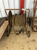 Hose reel on a 2 wheel trolley