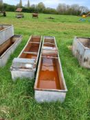 Quantity of metal water troughs