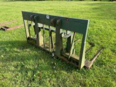 Manure fork with loading shovel attachments