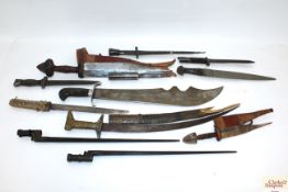 Twelve various edged items including some AF