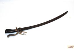 A small sword with white metal decoration of Easte