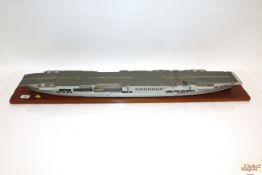 A wooden model of an aircraft carrier AF
