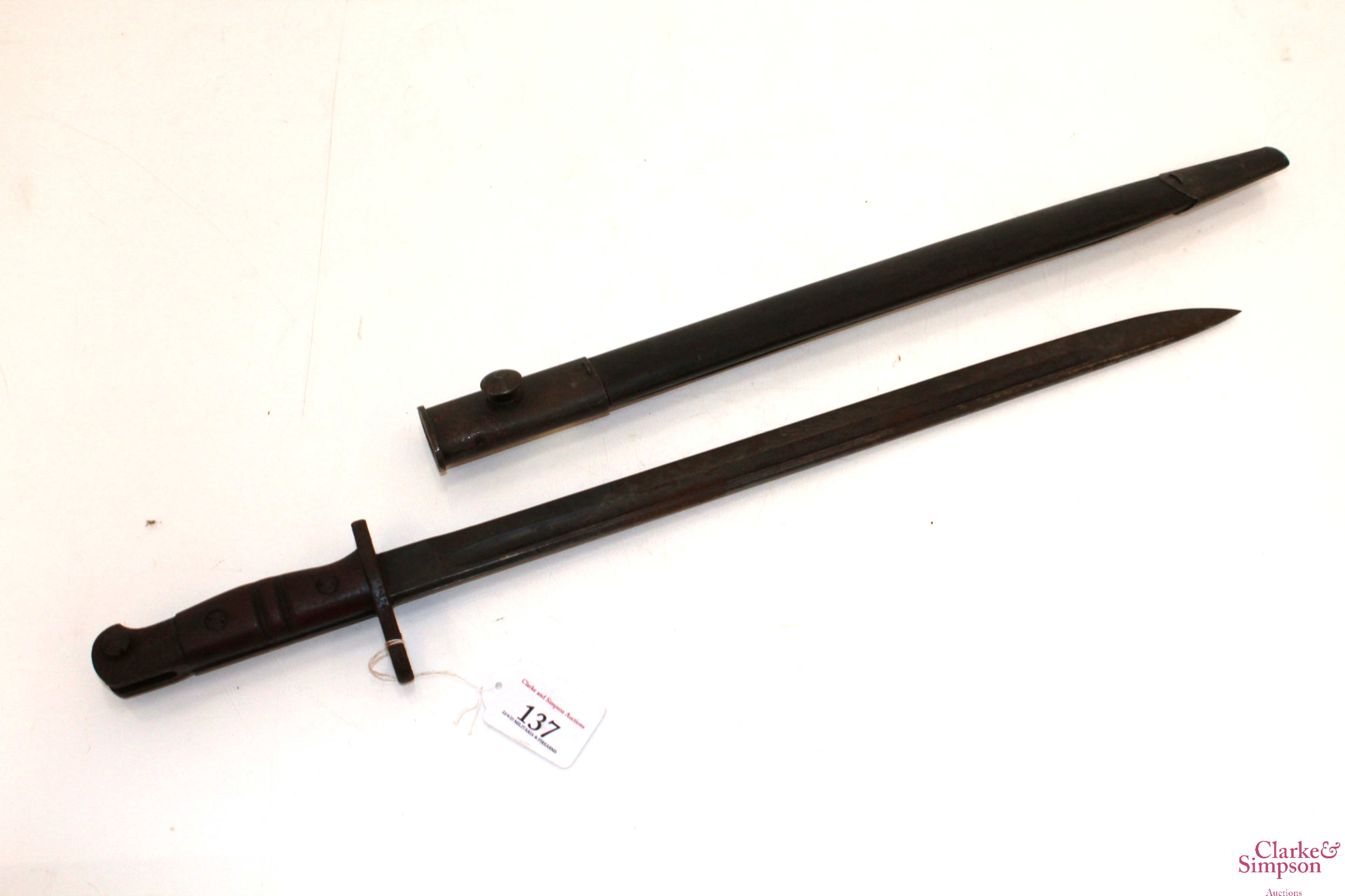 A model 1913 bayonet with scabbard